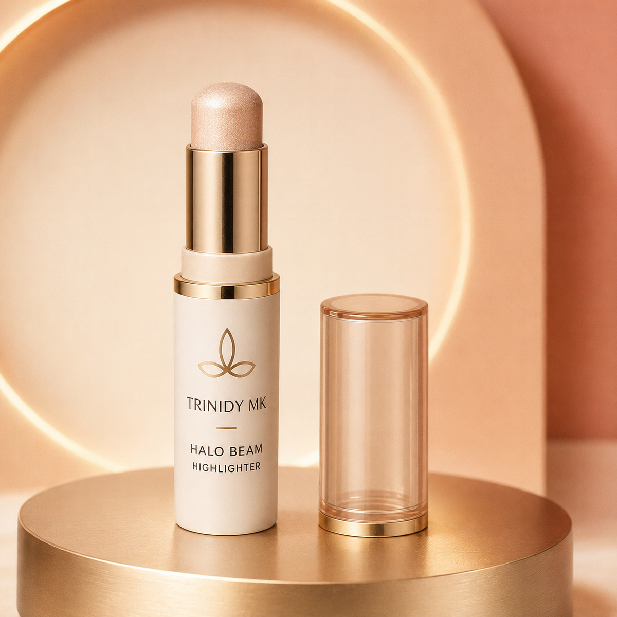Open Trinidy MK Halo Beam Highlighter Stick displayed upright in a luminous champagne studio setting